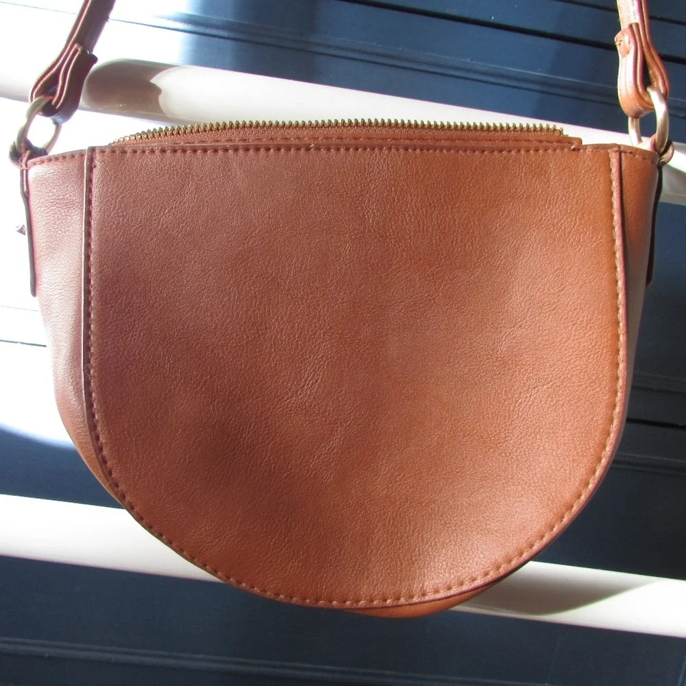 Time and Tru Cecile Crossbody Handbag in a brown or cognac color